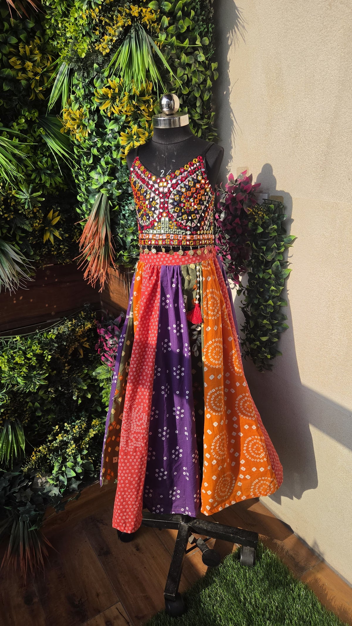 Pre Order: Beautiful Mirror Hand Embroidered Tie-up Top With Multicolour Bandhani Printed Lehenga