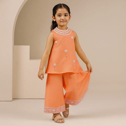 Pre Order: Orange Embroidered Kurti And Flared Palazzo