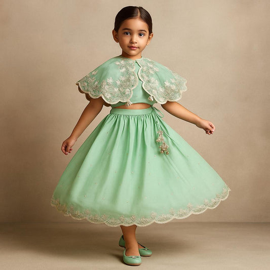 Pre Order: Green Embroidered And Embellished Cape Attached Top With Flared Lehenga
