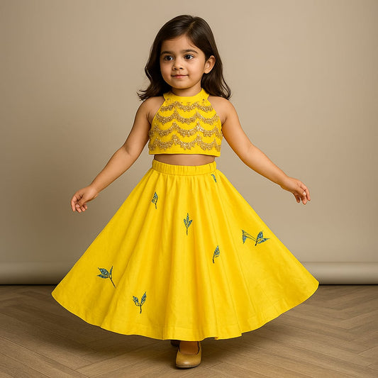 Pre Order: Yellow Embroidered Embellished Halter Neck Top And Lehenga