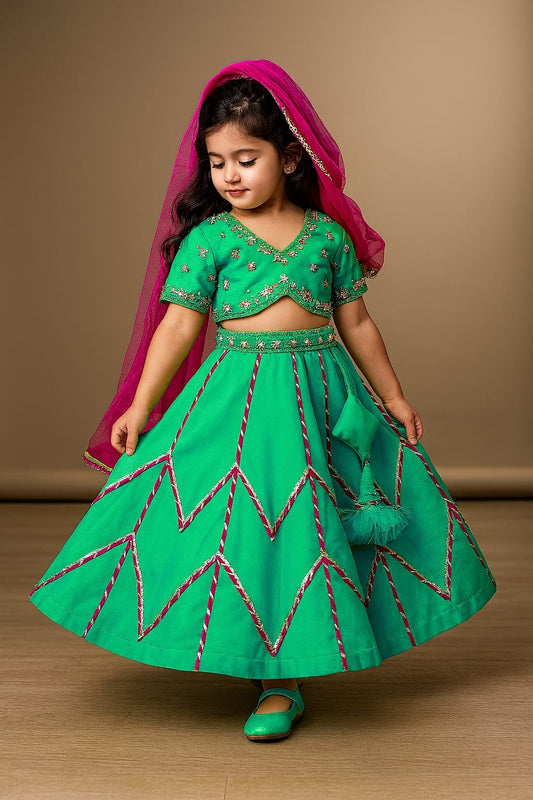 Pre Order: Sea Green Embroidered Crop Top With Lehenga And Net Dupatta