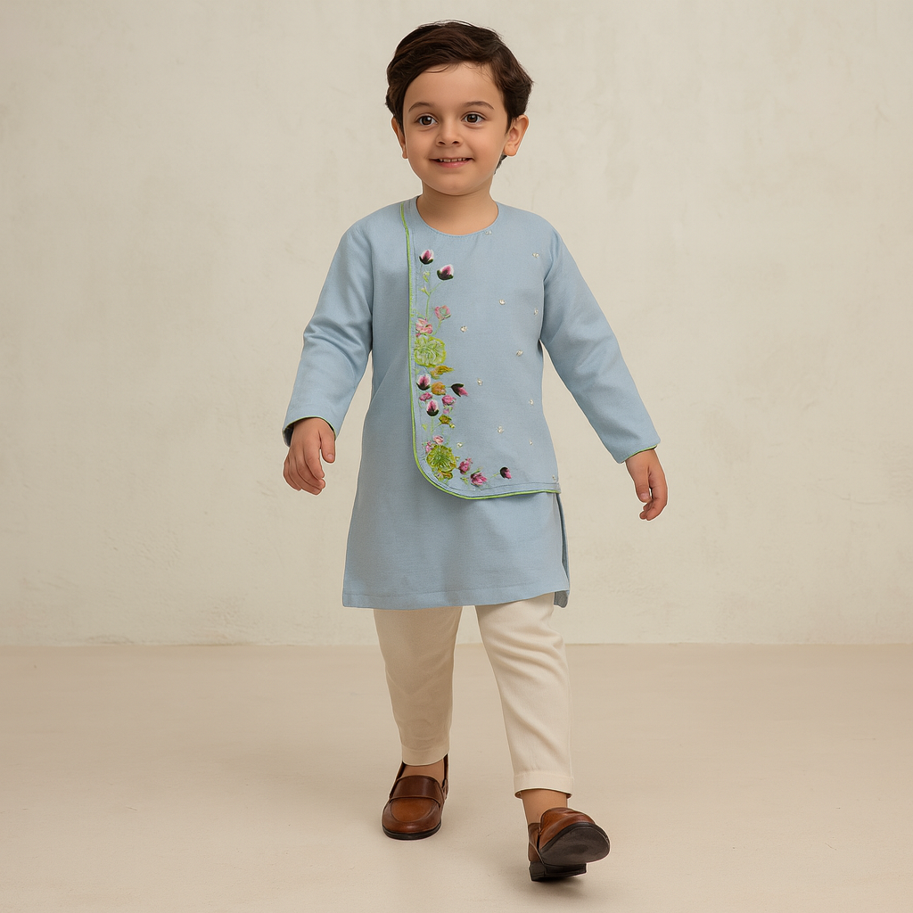 Pre Order: Blue Kurta With One-Side Embroidered Flap And Churidar